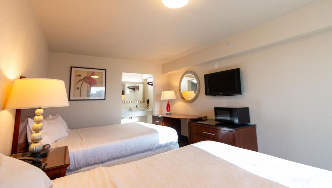 Magnuson Extended Stay And Suites Airport Hotel ايرفينغ المظهر الخارجي الصورة